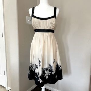 BCBG MAXAZRIA ivory/soy/black flower detail silk cocktail dress. Size 10